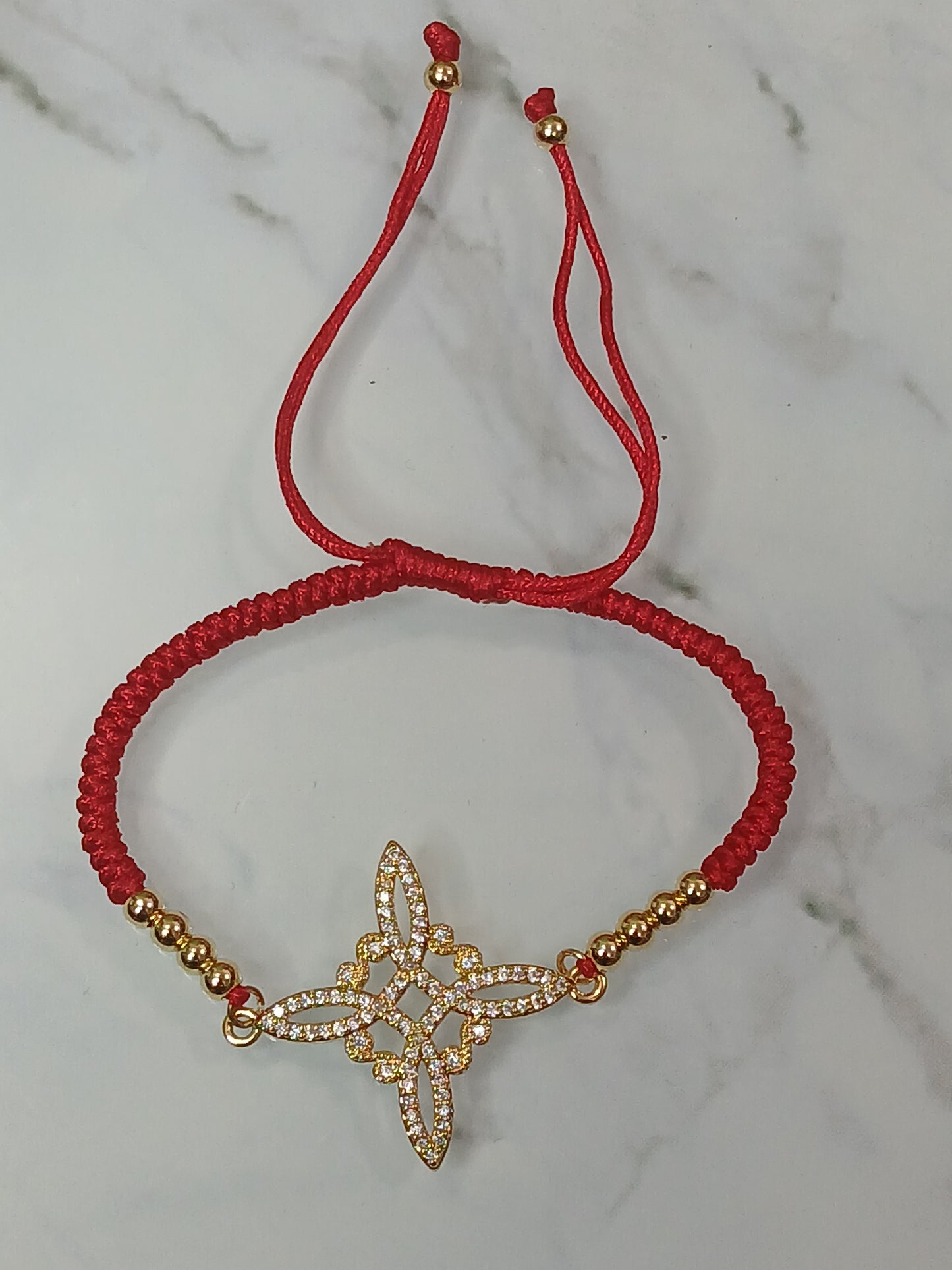Pulsera de proteccion baño de oro laminado.